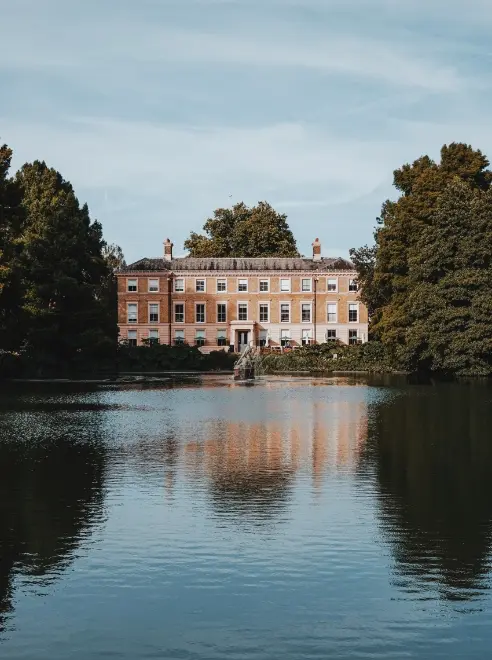 the palm house pond with the botanical restaurant in the background