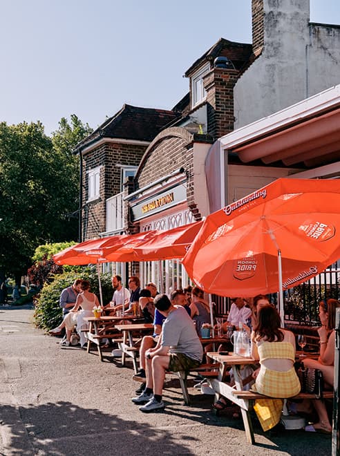 people sitting outside on a sunny day  at the Bell & crown pub