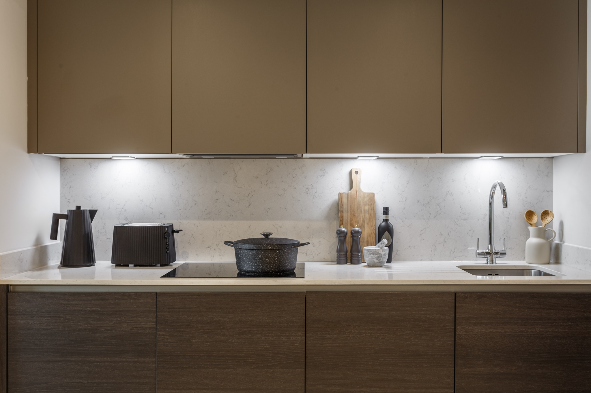 bed, dressing table, door with view  to lounge